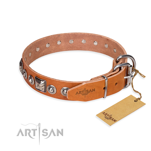 Leather dog collar made of soft to touch material with durable embellishments