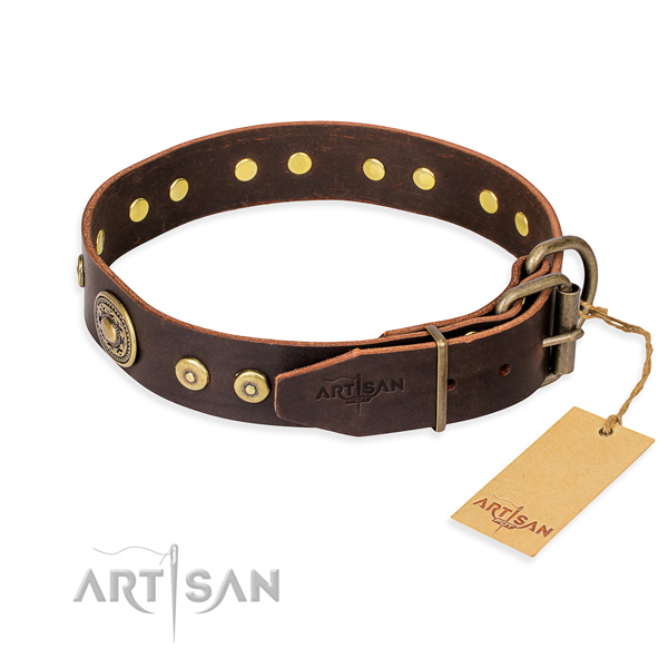 Genuine leather dog collar made of quality material with corrosion proof adornments